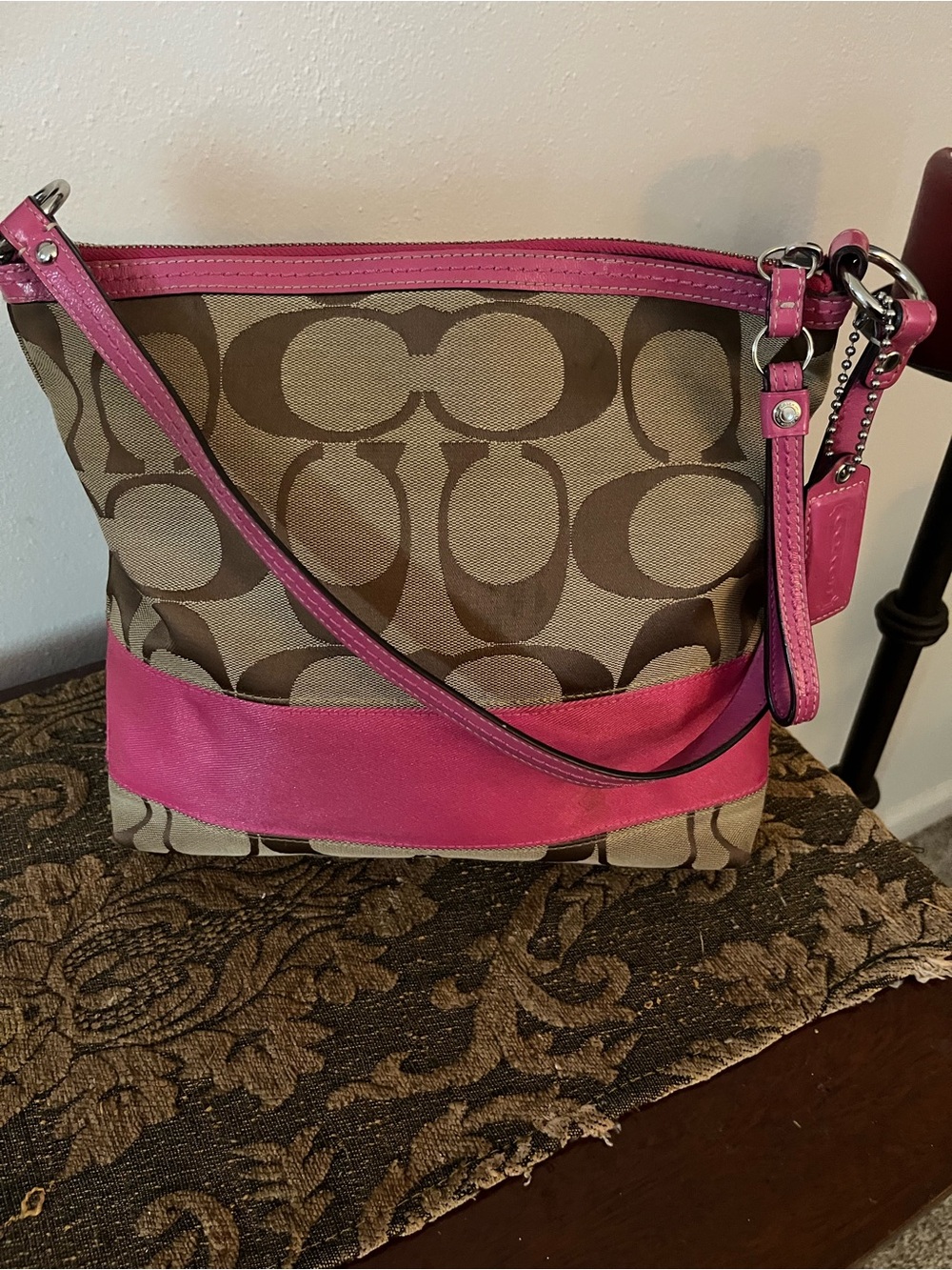 Coach Khaki Signature Fabric and Hot Pink Leather Trim should bag .